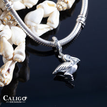 Load image into Gallery viewer, Pelican charm on coral spacer - pelican jewelry - beach charms