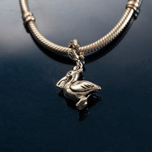 Load image into Gallery viewer, Pelican charm on coral spacer - pelican jewelry - beach charms