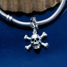 Load image into Gallery viewer, Skull and Cross bone charm on coral spacer bead - Sterling Silver