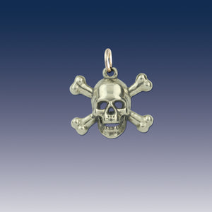 Skull and Cross bone charm on  - Sterling Silver - Pirate jewelry pirate charm nautical charm