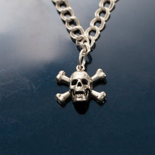 Load image into Gallery viewer, Skull and Cross bone charm on o ring - Sterling Silver - Pirate Jewelry
